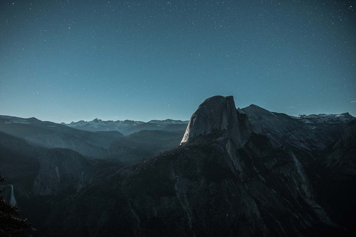 desktop wallpapers black mountain under blue sky at nighttime desktop backgrounds